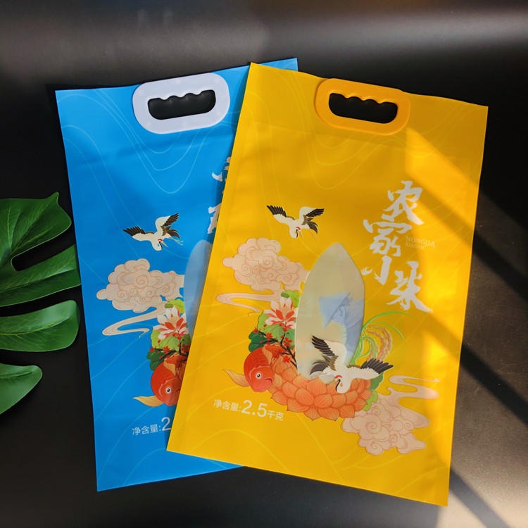 桎铭塑业定制大米塑料手提包装袋 食品自立自封袋 彩印粮食真空自立袋图片