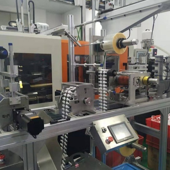 扬州振川机械生产各种一次性勺子包装机 塑料勺子包装机图片