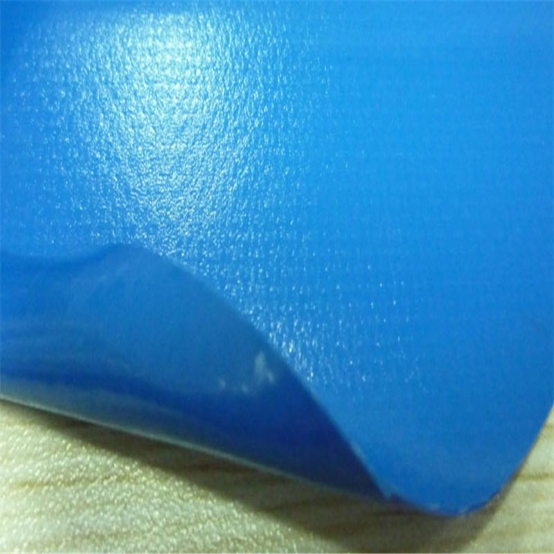 PVC镜面夹网布 蓝色0.45mmPVC防水涂层布 工艺包装面料图片